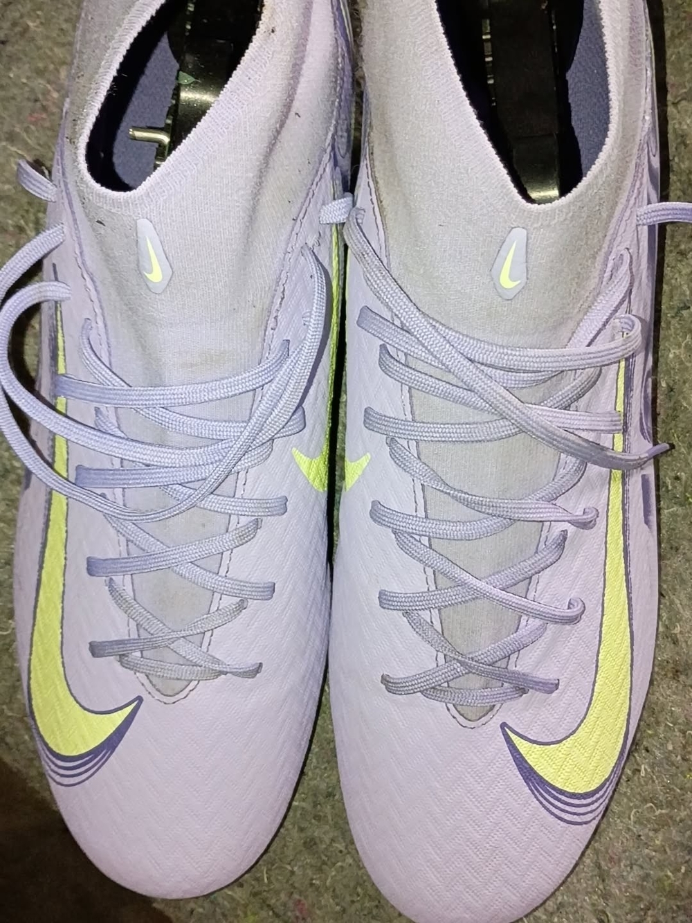 LebronNike Mercurial Superfly soccer cleats featuring a light purple upper accen